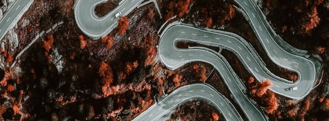 Image of a mountainous street from above